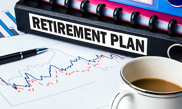 Binder with Retirement Plan Text and Papers/Charts